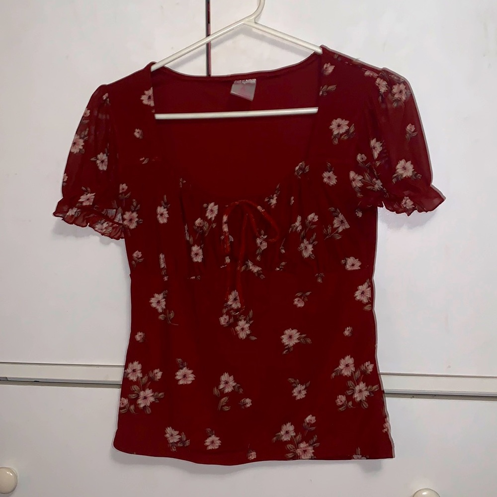 red blouse with white flowers